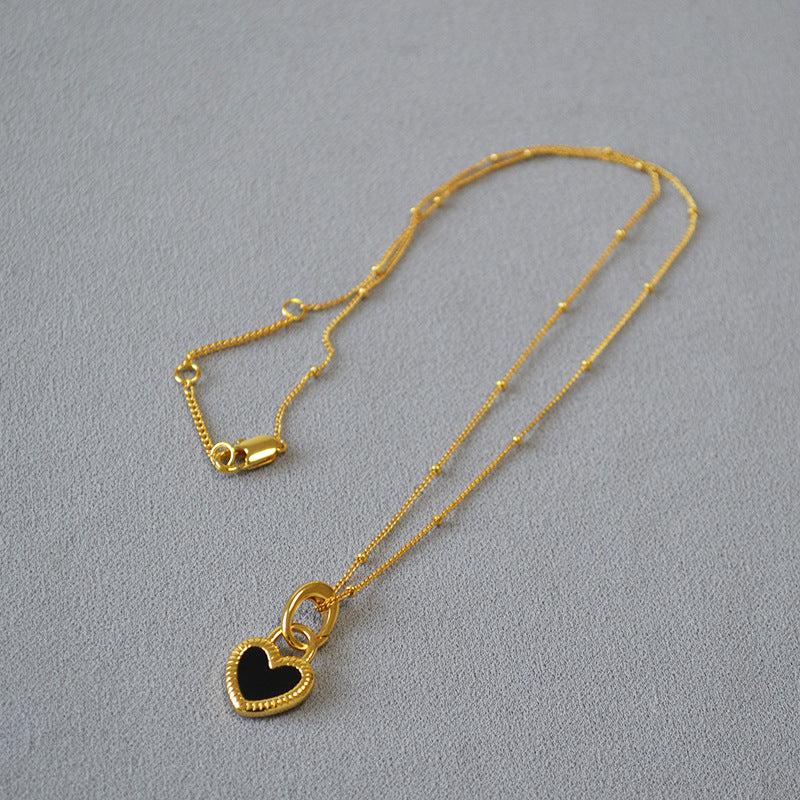 Black and White Heart Necklace in Gold