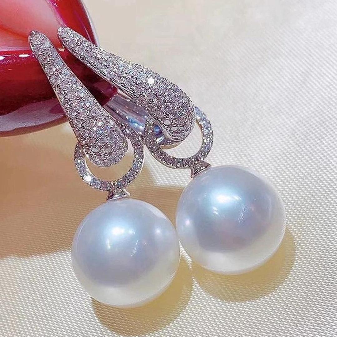 Pearl earrings with zircon in silver