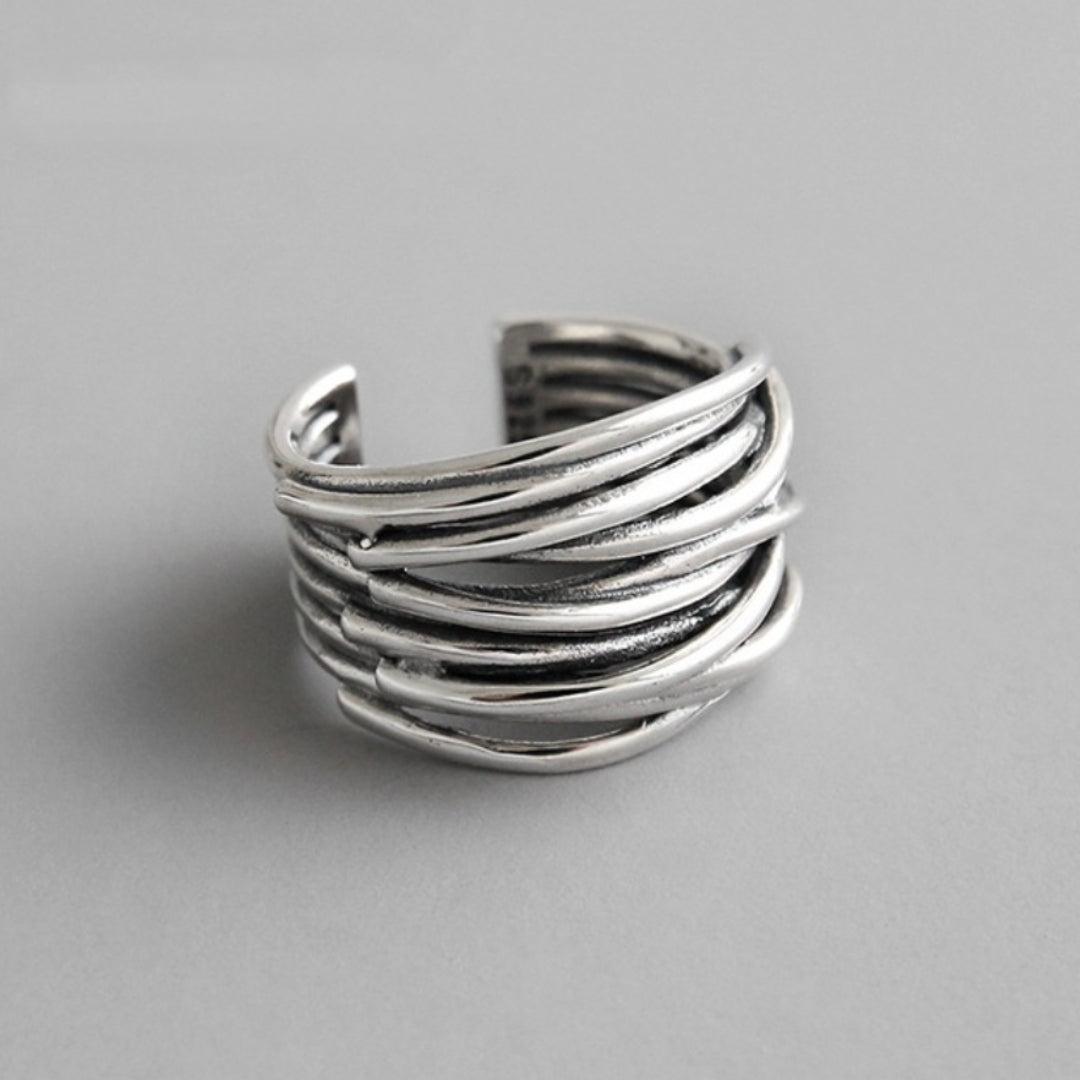 Adjustable silver layée ring