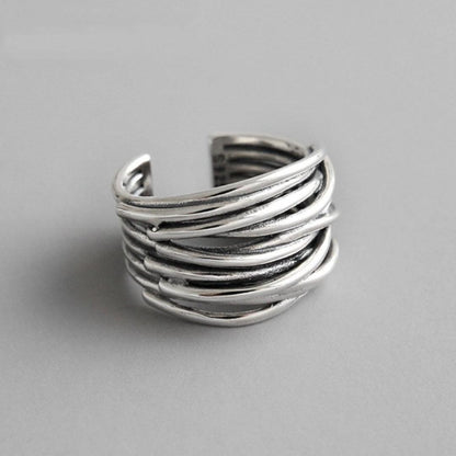 Adjustable silver layée ring