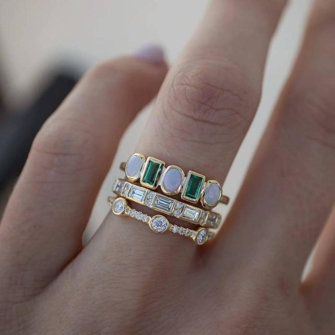 Vintage rings with white and green opal