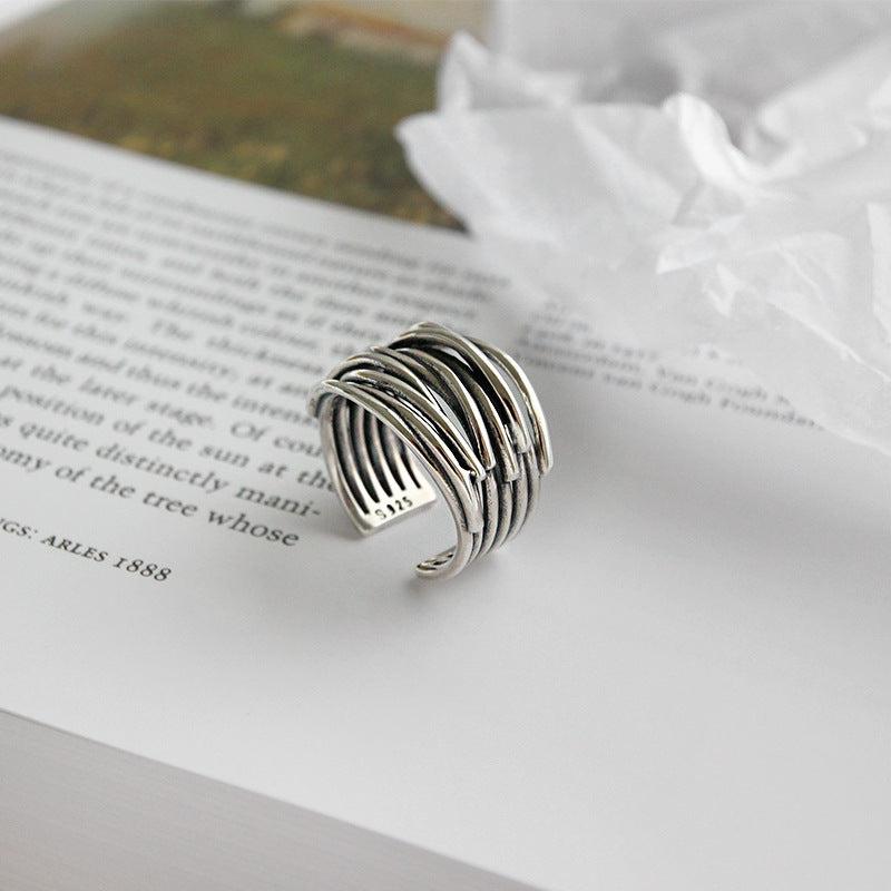 Adjustable silver layée ring