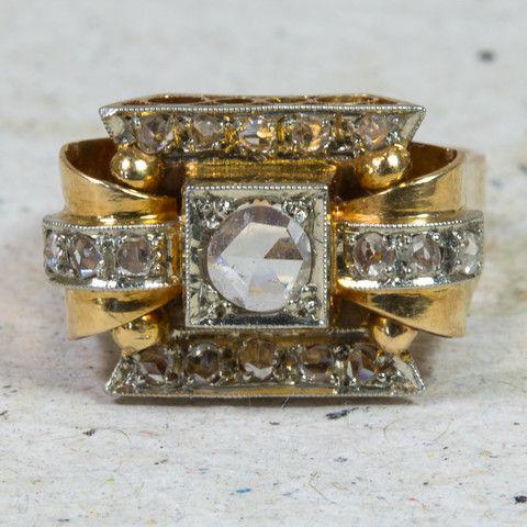 Gold ring with white crystal in vintage style