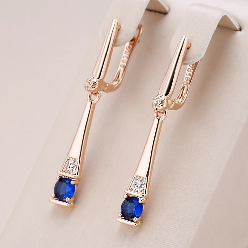 Blue Crystal Pendant Earrings in Gold