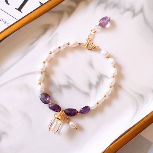 Bracelet with purple stones and pearls in gold